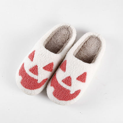 Model wearing Halloween Pumpkin Slippers in a cosy home setting — novelty pumpkin slip‑ons perfect for cosplay, parties and casual wear
