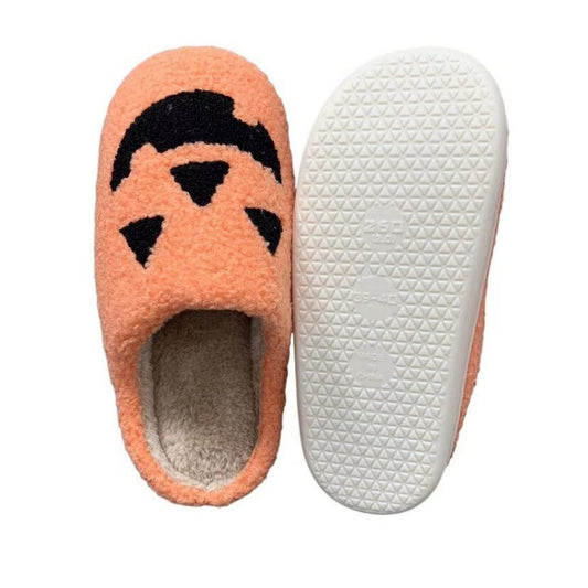Close-up of soft foam pumpkin slipper detail — plush texture, secure fit and slip-resistant sole for comfortable indoor Halloween wear
