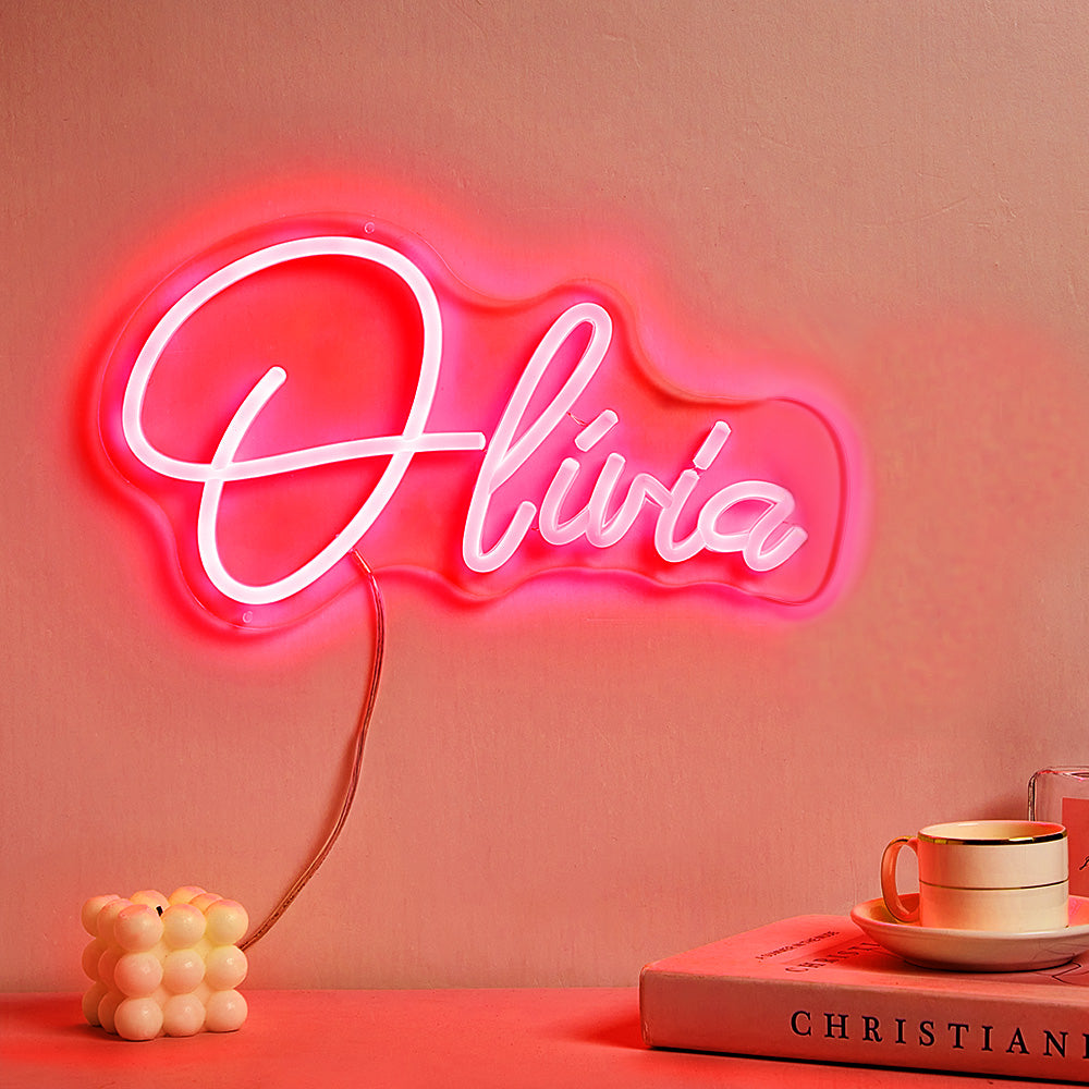 Script-style custom personalised neon name lamp glowing with soft light — LED neon sign example for personalised room styling