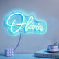 Personalised neon name lamp as a thoughtful gift on a bedside table — LED neon sign ideal for housewarmings and special occasions