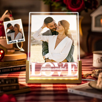 Personalised photo night light with laser‑engraved couple portrait on an acrylic panel and elegant wooden base, warm LED glow — custom couple anniversary lamp