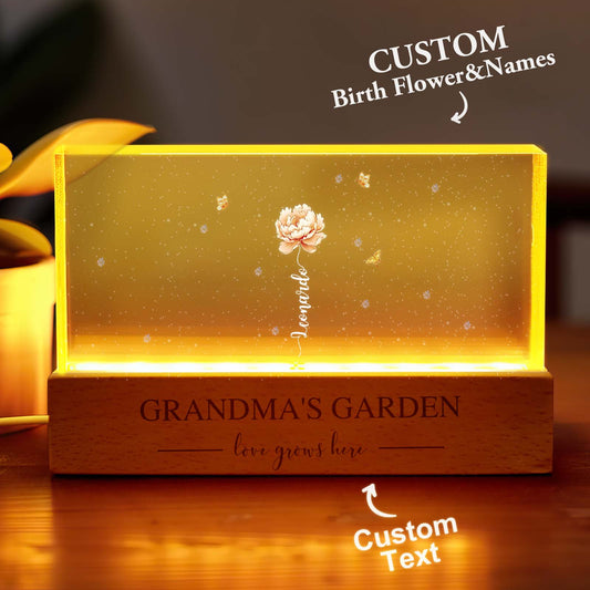 Front view of personalised birth flower night light for Grandma — LED acrylic keepsake with engraved names