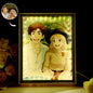 Close-up of the glass frame of the personalised lamp, emphasising the dual-frame design and space for a customised photo.