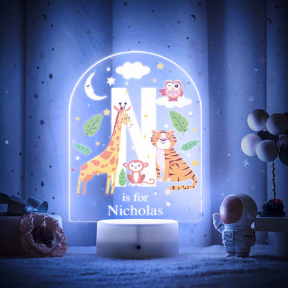 Engraved acrylic slide showing animal alphabet 'M' design with custom name example — personalised nursery lamp