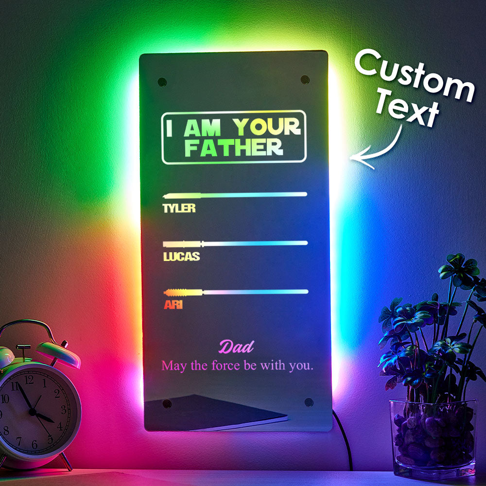 Personalised LED mirror lamp for Dad displayed on a shelf showing lightsaber-style backlighting and engraved custom names — ideal Father's Day or birthday gift