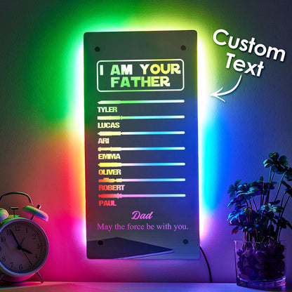 Desk display of lightsaber mirror lamp on supplied stand‑offs, compact personalised name lamp for office or bedroom