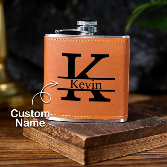 Personalised leather-wrapped 6oz (180ml) stainless steel whisky flask with engraved initials and stitched PU leather finish, front product shot — engraved gift for him