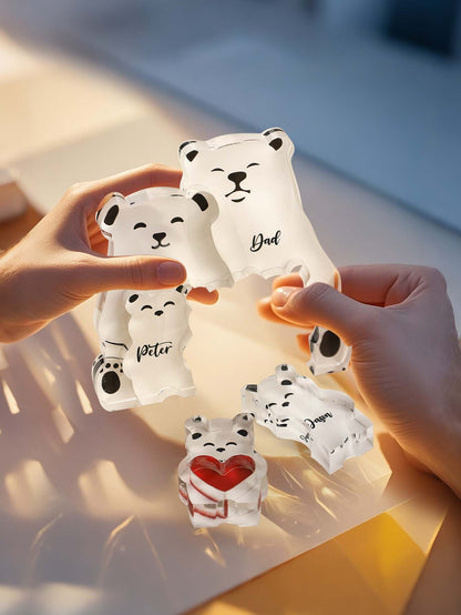 Close-up of personalised acrylic bear puzzle showing precision engraving of family member names and a clean contemporary finish