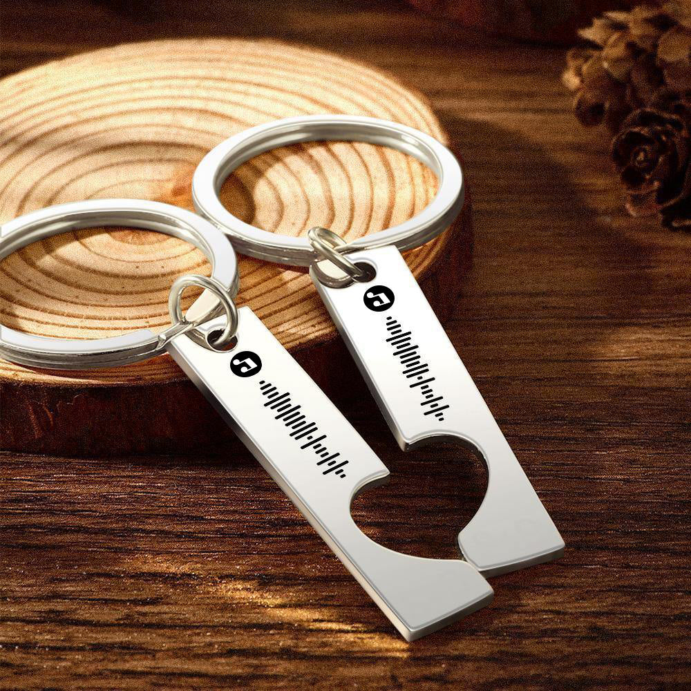 Close-up of personalised Spotify music code keyring with 3D engraved scan code and heart cut-out on stainless steel keychain – ideal gift for friends