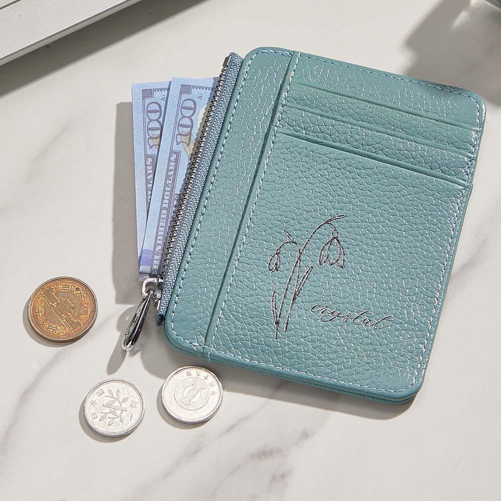 Close-up of personalised birth flower and name engraving on PU leather personalised wallet — elegant keepsake gift