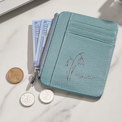 Close-up of personalised birth flower and name engraving on PU leather personalised wallet — elegant keepsake gift