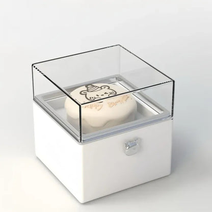 Detailed view of the twist mechanism that rotates and raises the ring in the Bear Cake Ring Box for a dramatic proposal reveal