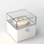 Detailed view of the twist mechanism that rotates and raises the ring in the Bear Cake Ring Box for a dramatic proposal reveal