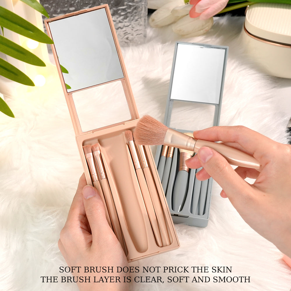 Hand holding a custom engraved eye brush applying shadow — personalised make-up brushes suited to everyday use and professional kits