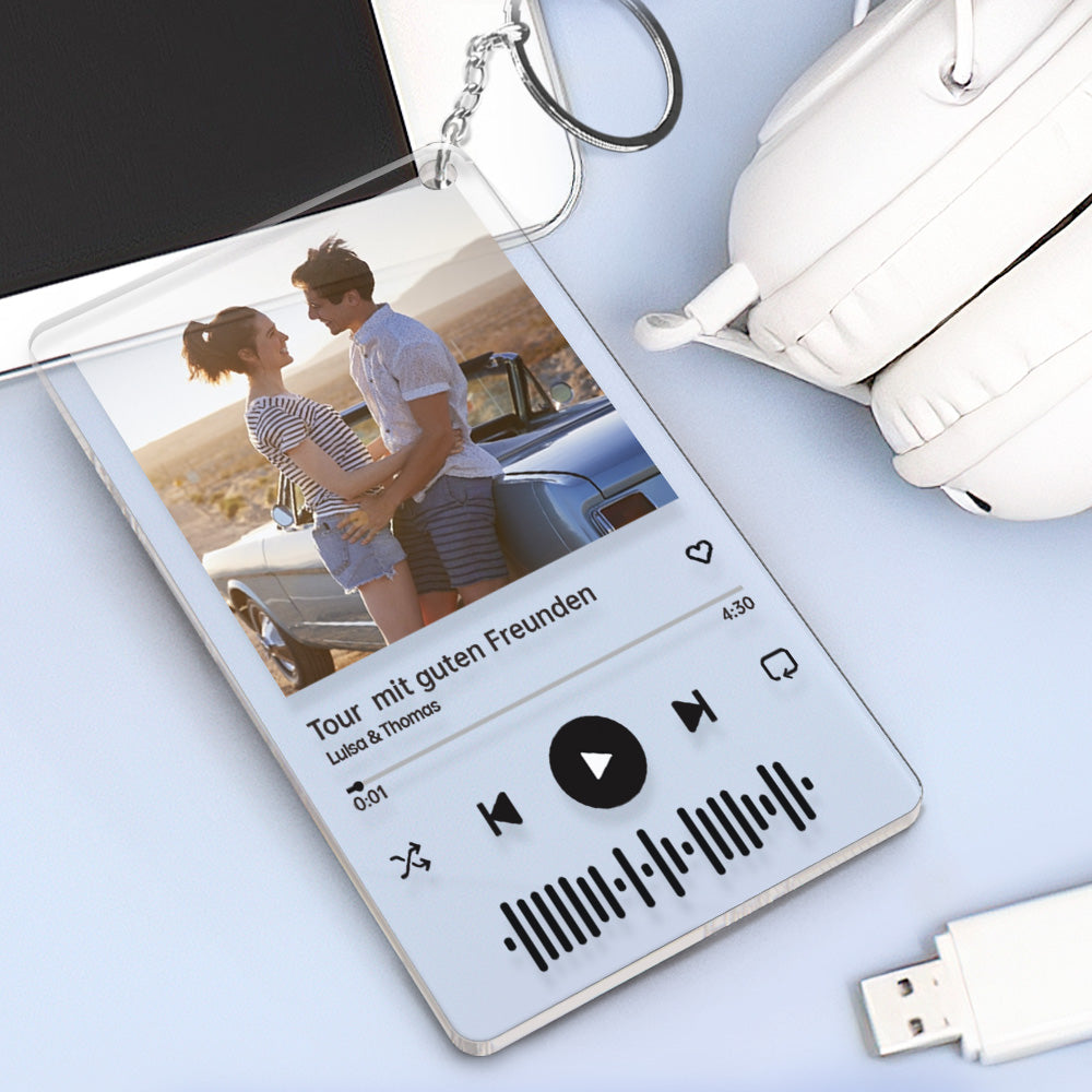 Detail of sturdy metal split ring and slim clear acrylic edge on personalised music code keyring, durable and pocket-friendly acrylic album keychain