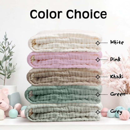 Blanket draped in a nursery setting, showcasing its soft cotton feel and lace edging.