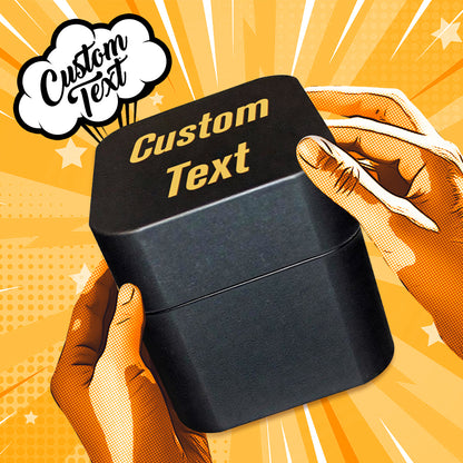Novelty desk ornament: personalised middle finger in a box displayed on a workspace, eye-catching conversation starter