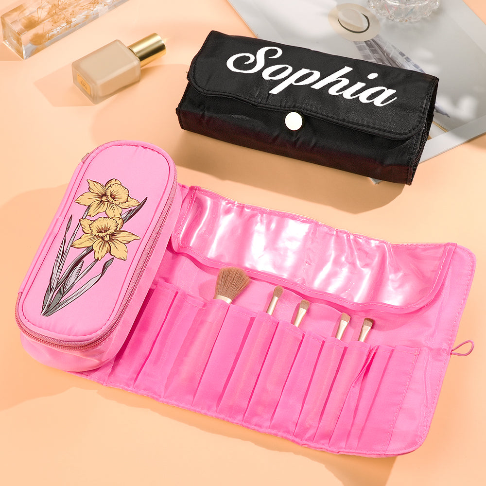 Close-up of personalised make-up brush bag showing name and birth flower design printed on durable nylon, wipe-clean custom pouch