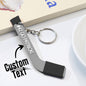 Scale reference image illustrating the tiny dimensions of the personalised 3D‑printed hockey stick keyring — ideal as a keepsake or key accessory