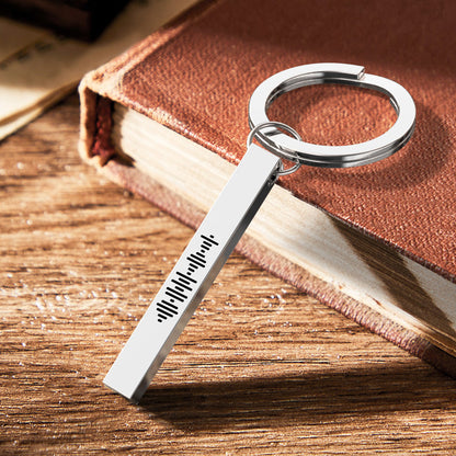 Silver personalised 3D bar keychain showing smooth polished surface and corrosion-resistant stainless steel construction