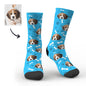 Model wearing personalised face socks to demonstrate fit and design — adult personalised novelty socks available in multiple sizes