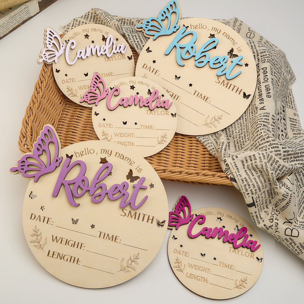 Gift presentation of personalised wooden butterfly birth plaque in eco-friendly packaging — ideal personalised baby gift for new parents
