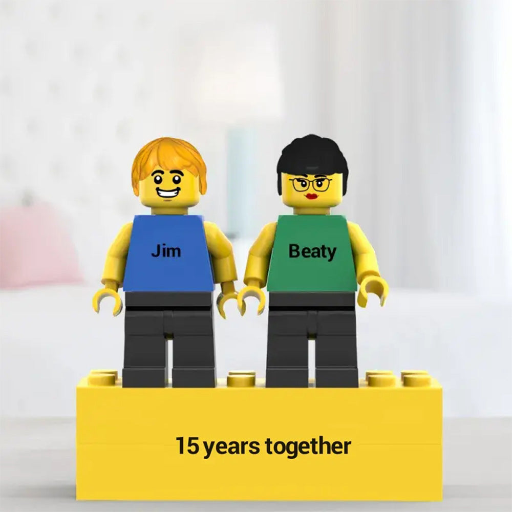 Open display box showing personalised couple minifig and engraved base – bespoke romantic gift for couples
