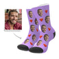 Print detail of customised photo socks showing bright, long‑lasting heat‑transfer colours on breathable fabric
