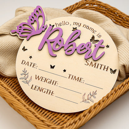 Styled nursery shot with a personalised butterfly birth announcement sign on a shelf as a charming baby shower keepsake and room decoration