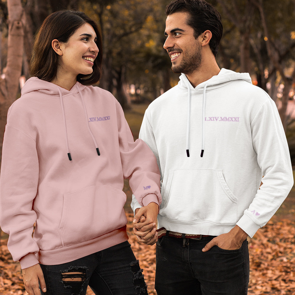 Unisex personalised hoodie showing embroidered date in Roman numerals — comfortable everyday cotton wear