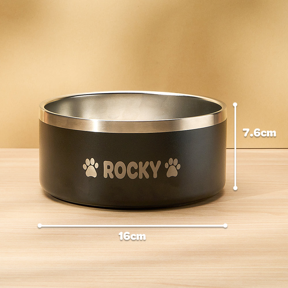 Lifestyle image of personalised 32oz stainless steel dog bowl filled with water beside a dog – ideal gift for pet owners