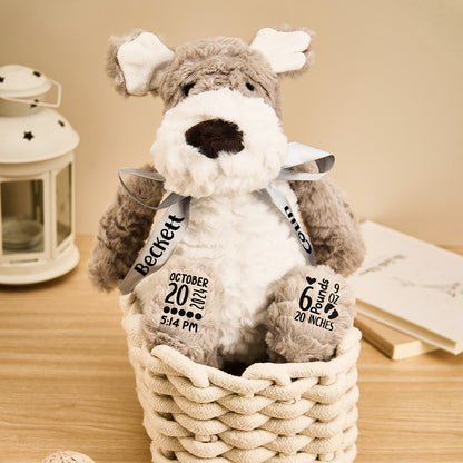 Close-up of personalised puppy dog plush displaying plush fabric and clear embroidered birth stats — snuggly newborn toy ideal for baby showers and nursery décor