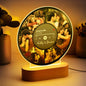 Close up of personalised LED photo lamp lit with warm ambient light showing etched photos on premium acrylic — custom photo collage night light, ideal gifts for couple