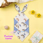 Small 30cm square baby comforter resting on a neutral surface.