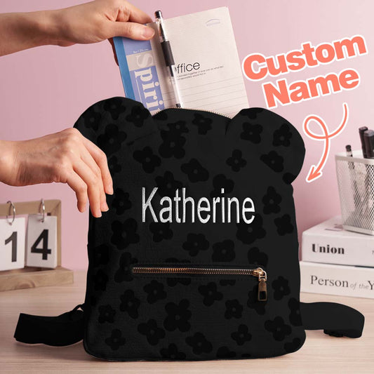 Front view of personalised name embroidered mini flower backpack in canvas — custom canvas school bag for kids, compact 26×13×28cm