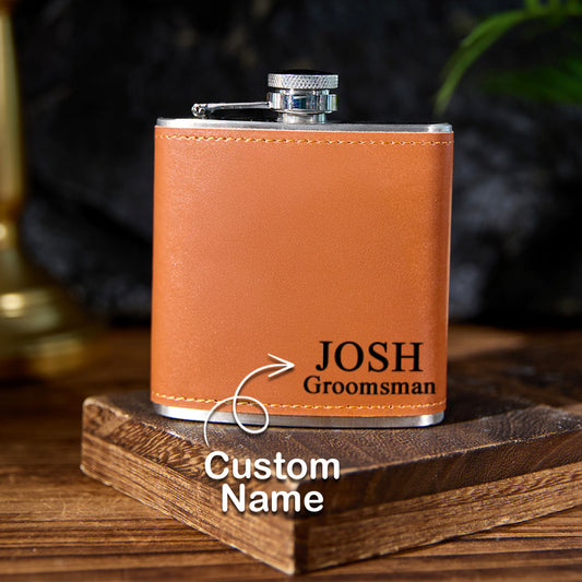 Personalised 6oz whiskey flask wrapped in premium PU leather with deep engraved name on stainless-steel body — perfect groomsmen or father gift