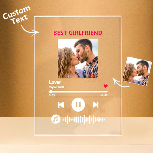 Personalised acrylic music plaque with engraved scannable song code, custom photo and matching photo keychain beside LED night light holder