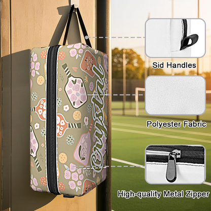 Personalised pickleball pouch open with two pickleball balls inside — organised, easy-access ball holder