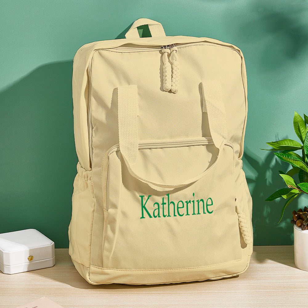 Side profile of personalised embroidered backpack showing name customisation and reinforced stitching — ideal travel or school bag gift for friends