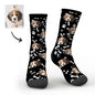 Assortment of personalised socks in multiple colours showcasing custom dog avatar and face prints — personalised novelty socks for all ages
