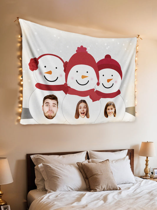 Personalised Photo Tapestry featuring a snowman wall hanging with 1–6 custom faces on the belly, in soft peach skin velvet.