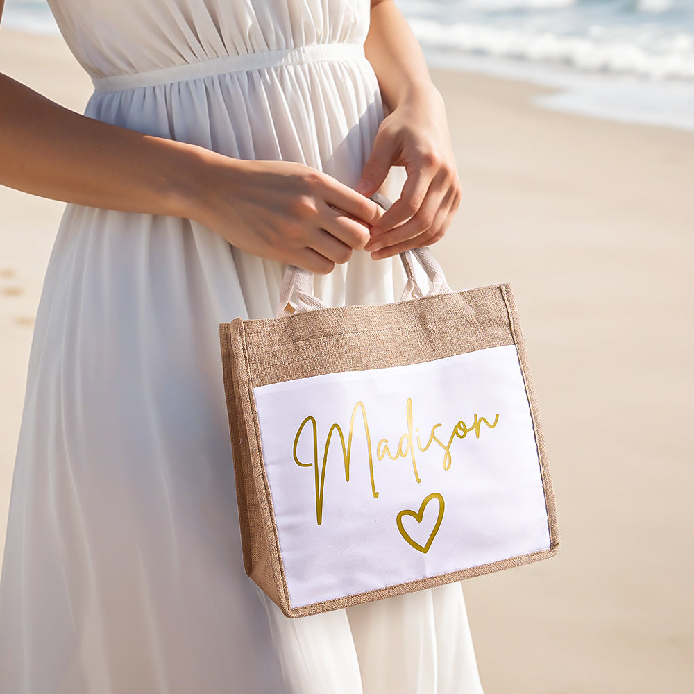 Close-up of personalised jute tote bag with pocket showing custom name print — ideal bridal party gift