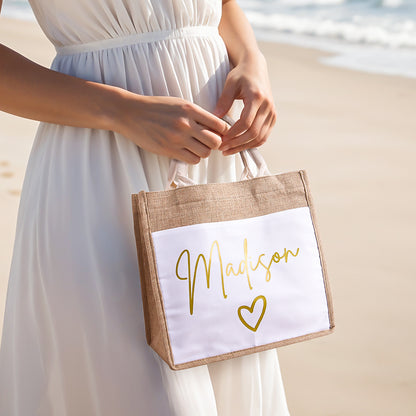 Close-up of personalised jute tote bag with pocket showing custom name print — ideal bridal party gift