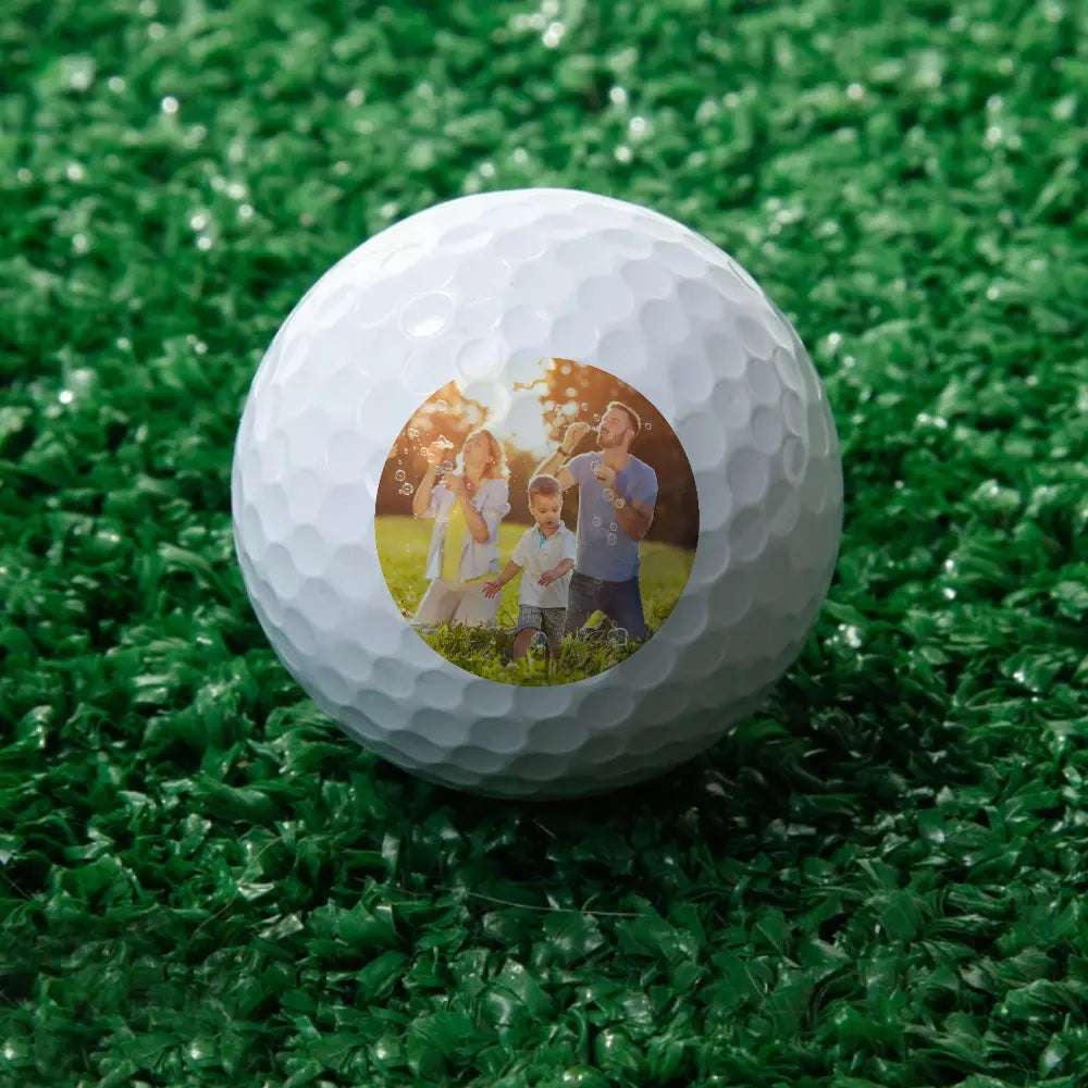 Assortment of personalised photo golf balls illustrating customisation options, sample designs and gift ideas for golf enthusiasts