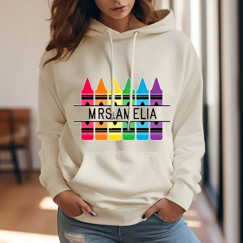 Side view of personalised crayon hooded sweatshirt showing hood and sleeve — lightweight polyester, easy-care and ideal for school staff