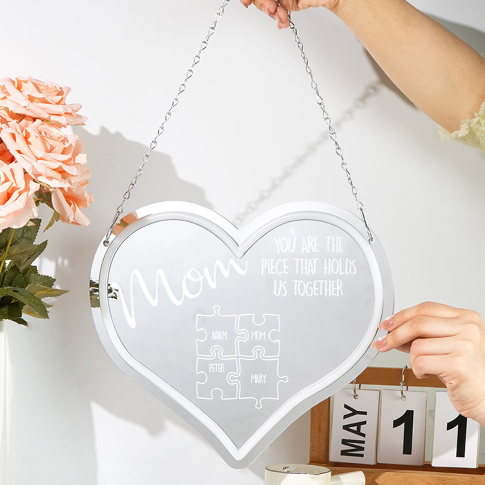 Lit Personalised Mum Puzzle Sign neon mirror light on a bedside table, warm LED glow creating a cosy ambience with custom kids' names visible – bespoke family keepsake gift