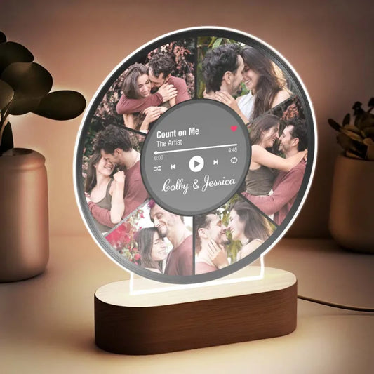 Personalised night light with custom photo collage laser‑engraved on an acrylic panel seated in a natural wooden base, warm LED glow — personalised lamp, anniversary or wedding gift for couples