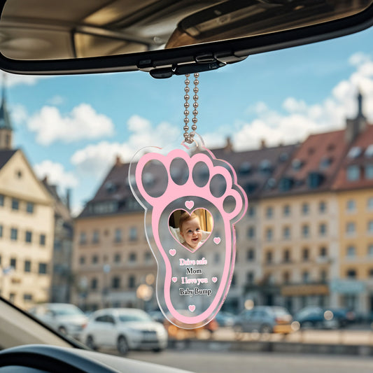 Personalised drive safe baby footprint car mirror hanger in clear acrylic, a custom photo gift for dads featuring a baby footprint motif.