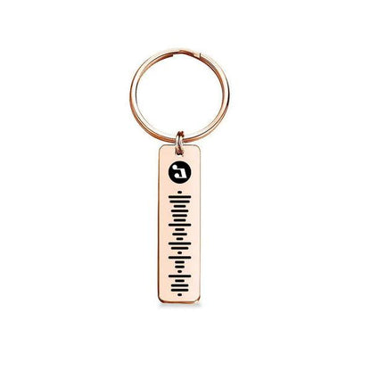 Front and back views of personalised music code metal keychain highlighting engraving and durable finish