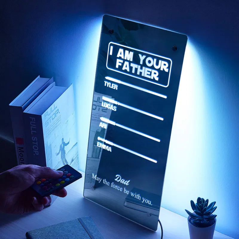 Close-up of the LED base and power connection for the personalised lightsaber mirror lamp, showing quality finish and simple plug-in setup